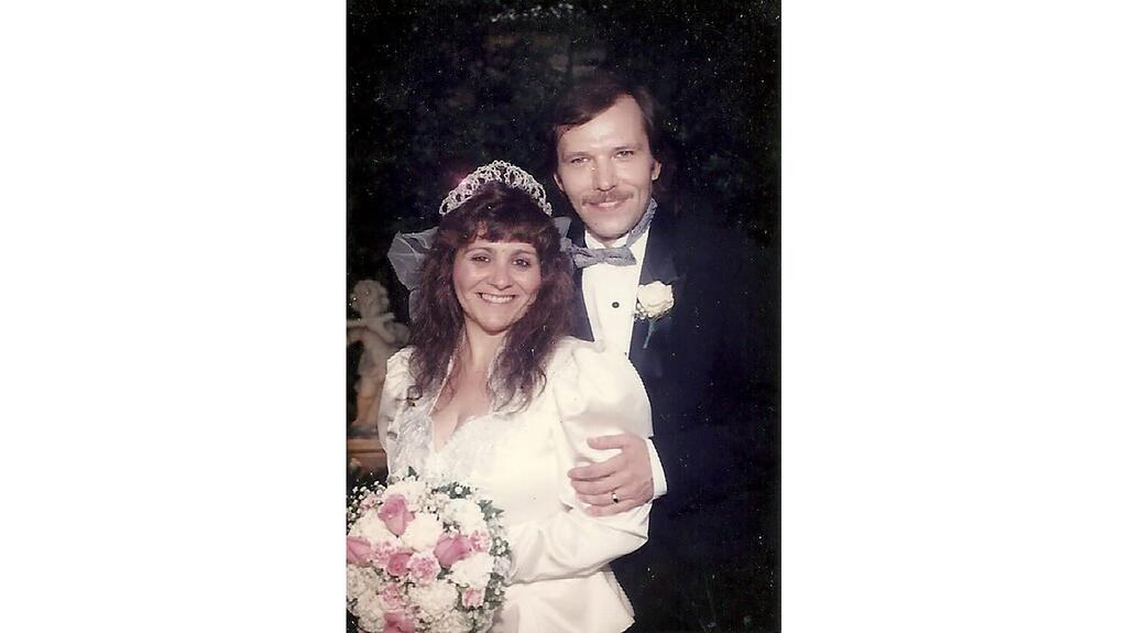 My parents, Mary and Bruce, on their wedding day in July 1993. My mom wore a white satin power suit and a tiara, because, as they say, go big or go home. 20220506_Mother's Day-1.jpg